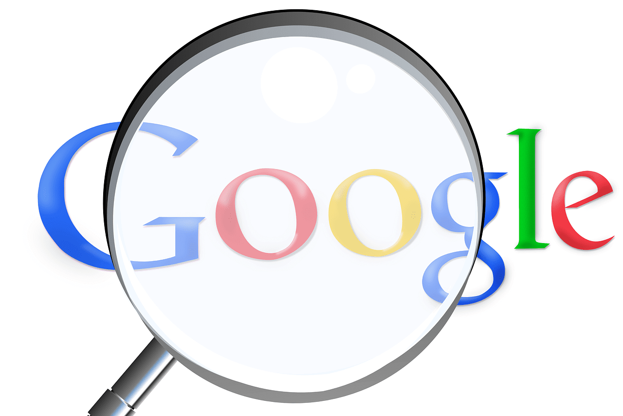 Magnifying glass over Google logo